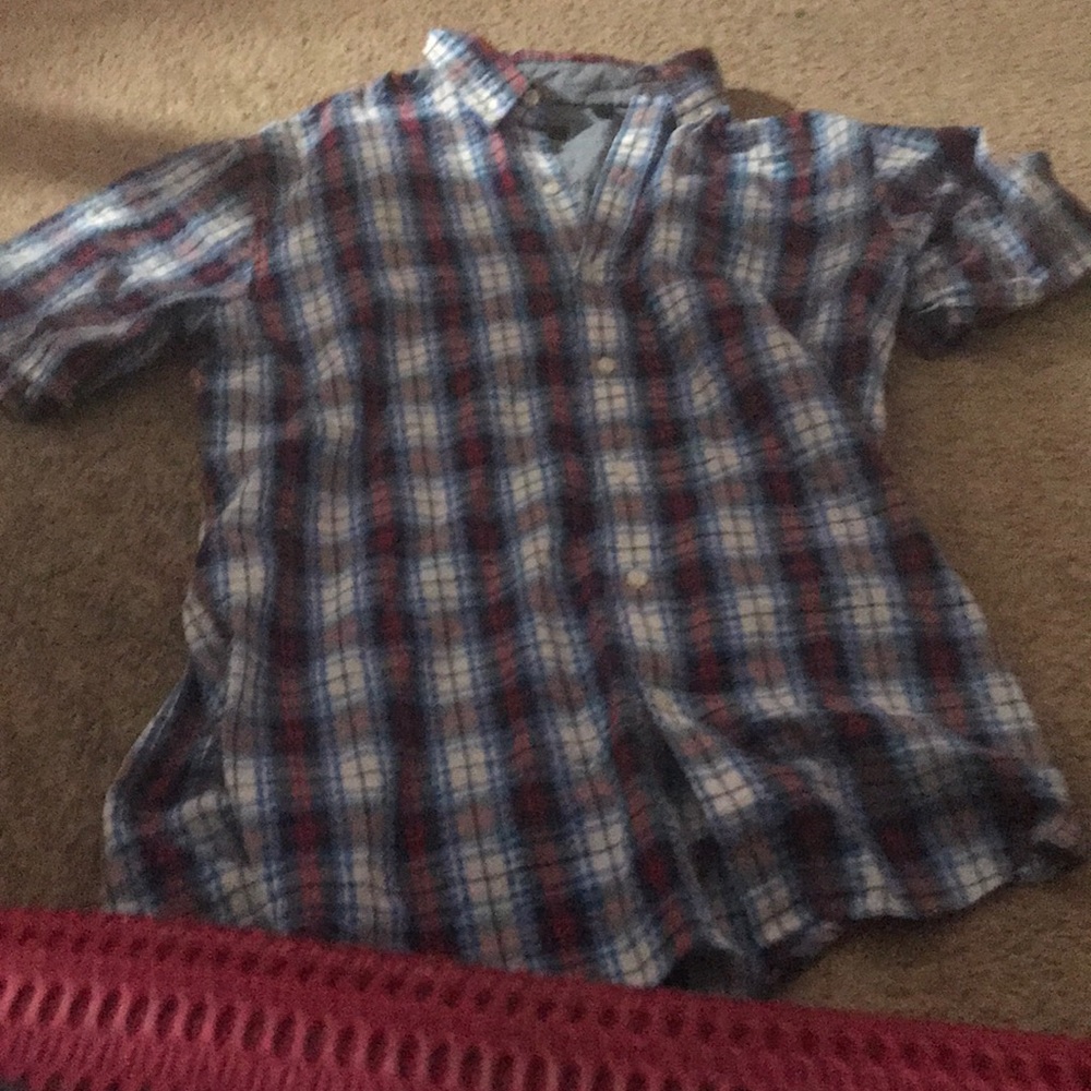 A kids medium dress shirt